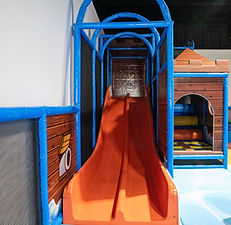 Slide and active play area at Playdate LLC.
