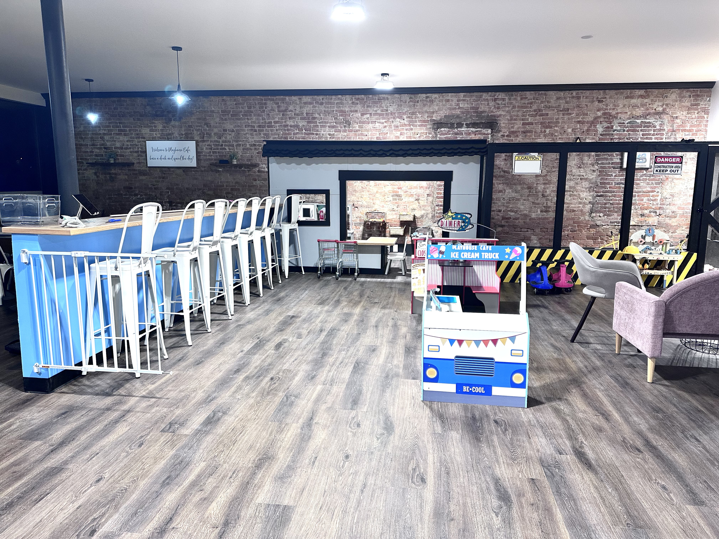 Open play area and café seating inside Playhouse Cafe