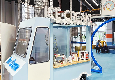 Pretend-play storefront area at PlayPie Buena Park.