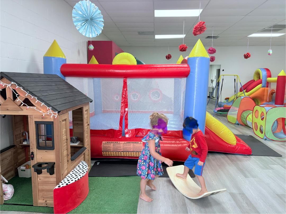 Indoor playground seating and play structures at Playtime Anytime Crossville.