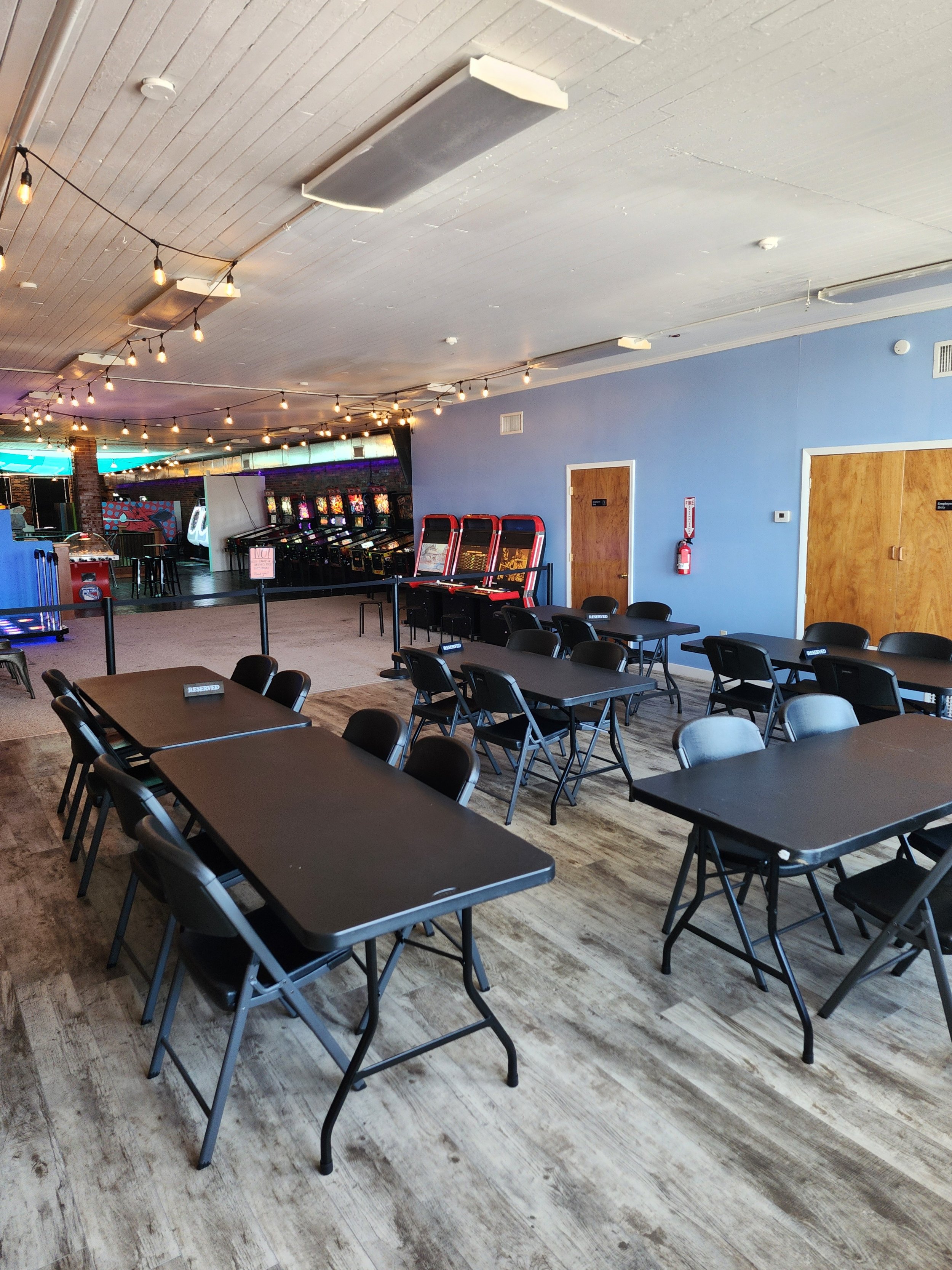 Event space setup inside Point Break Arcade.