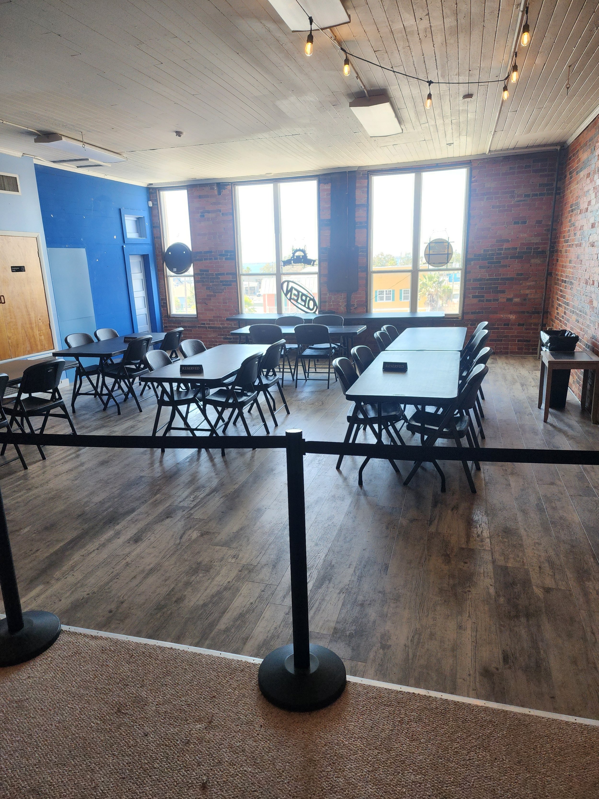 Additional party and seating area inside Point Break Arcade.