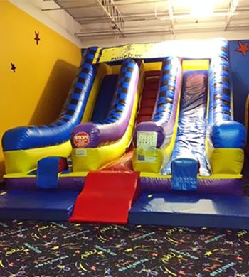Inflatable slide at Pump It Up