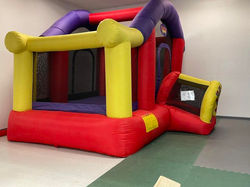 Bounce house inside Rainforest Play Zone.