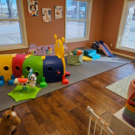 Toddler play corner at Reagan & Quill's Kiddie Kingdom.