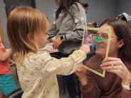 Adult and child participating in a Create N' Play activity at Recreation Station in Tomah.