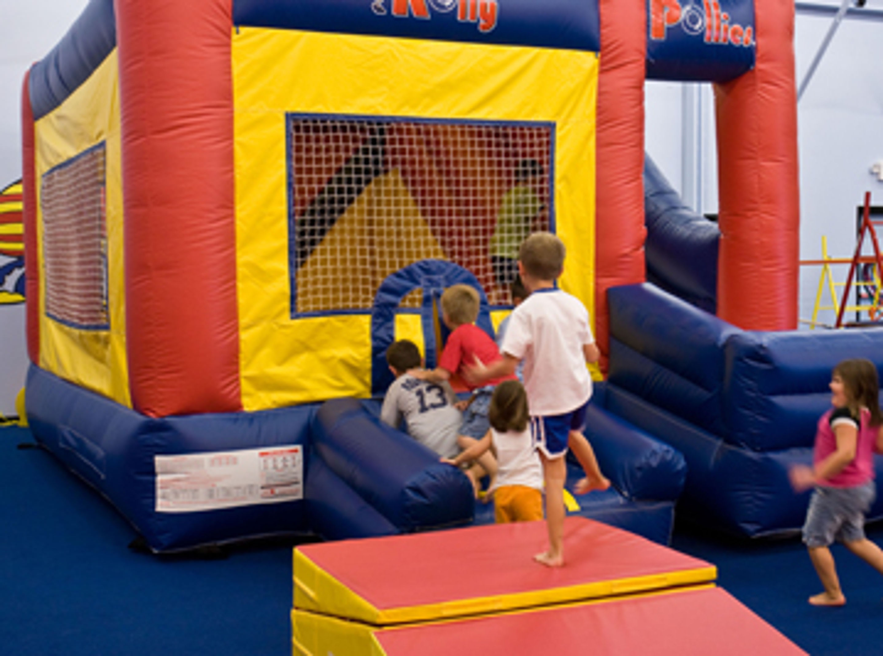 Inflatable-style gym play at Rolly Pollies