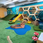 Indoor play structure at Rough & Bumble KC.