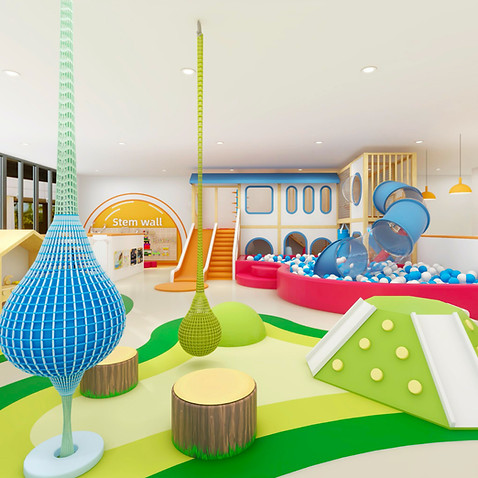 Bright indoor play area with soft-play and pretend-play elements at run+play kids cafe.
