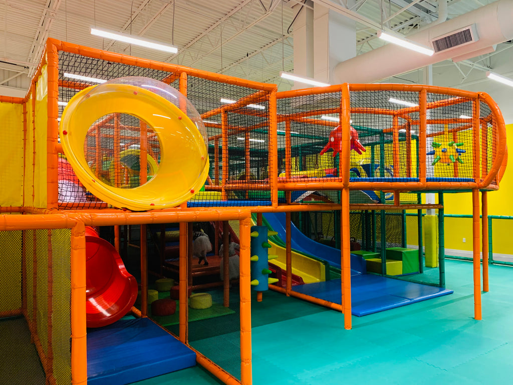 Colorful climbing and slide play at Safari Auburn