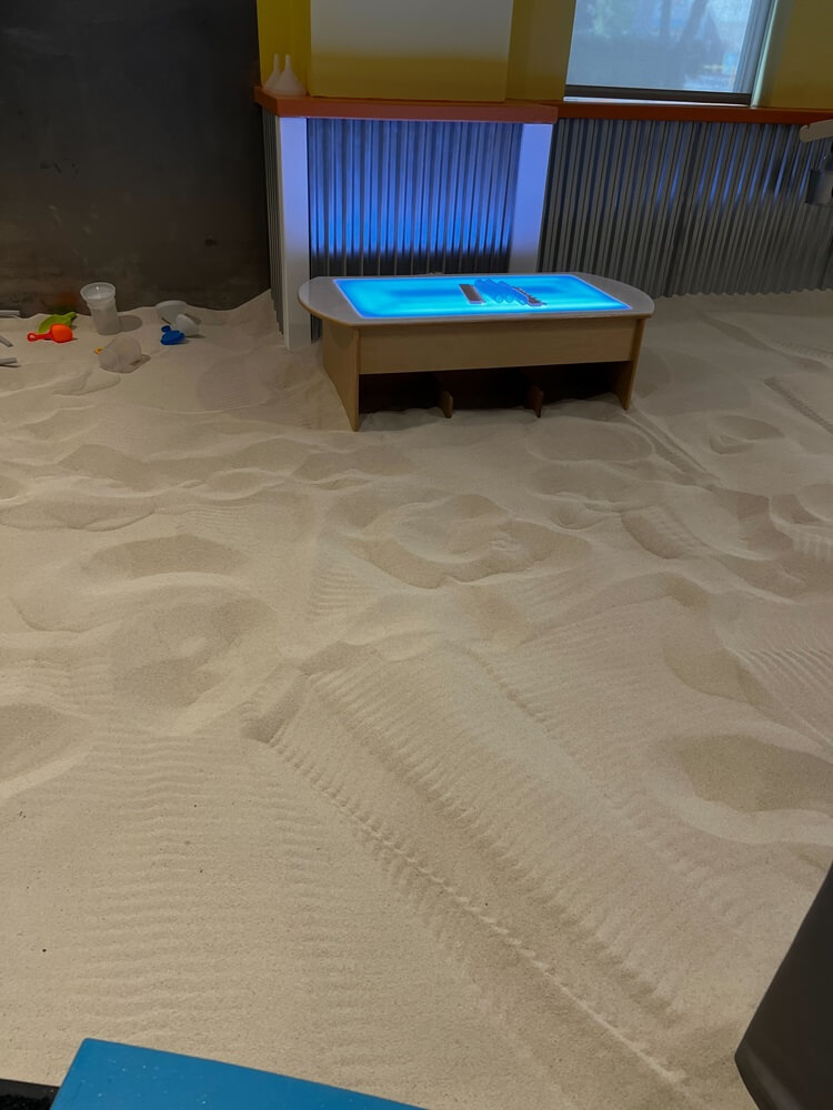 Interactive table in the sand area at Sandmagination