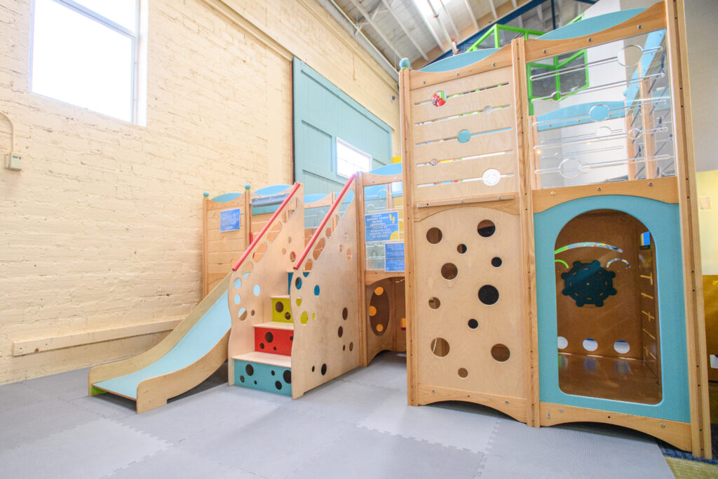 Toddler climbing and slide structure at Santa Fe Children's Museum