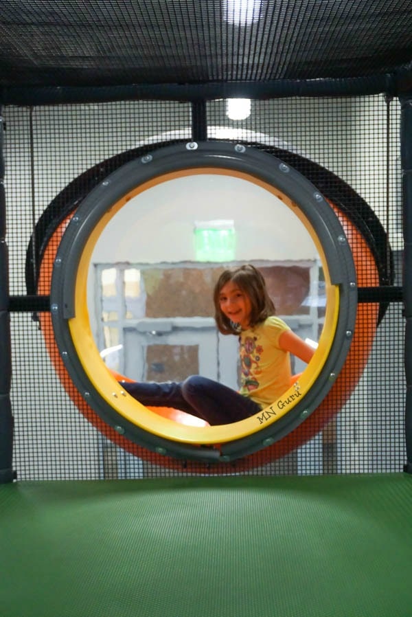Interior tunnel window inside the KidZone play structure.