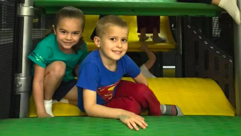 Children inside the padded play structure at Hangtime Jr