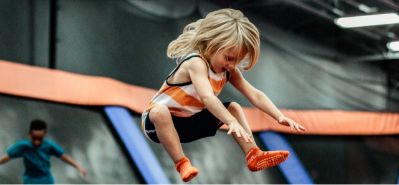 Kids enjoying Sky Zone trampoline play
