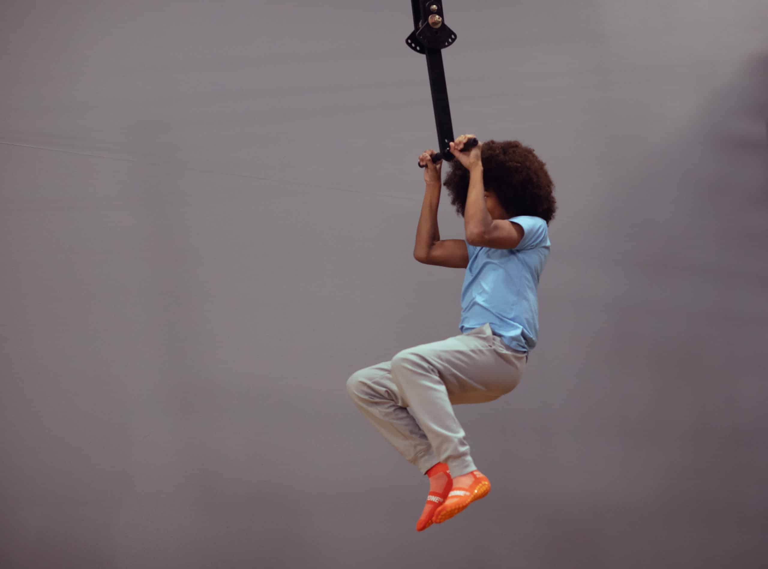 Zip-line or aerial challenge attraction at Sky Zone.