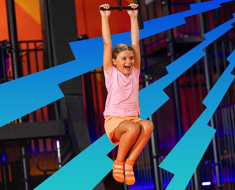 Kids celebrating in the attraction area at Sky Zone