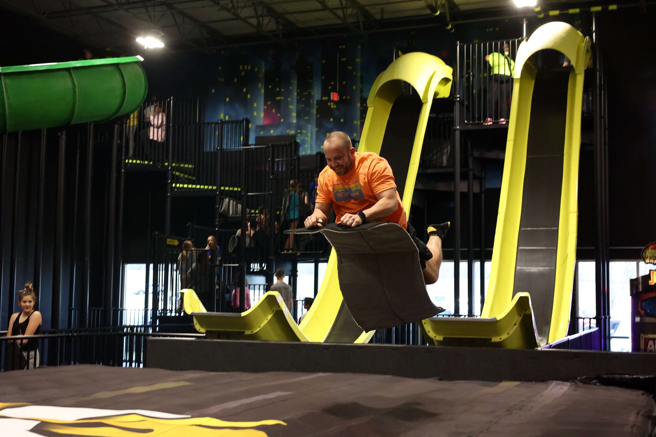 Slide attraction inside Slick City Nashville