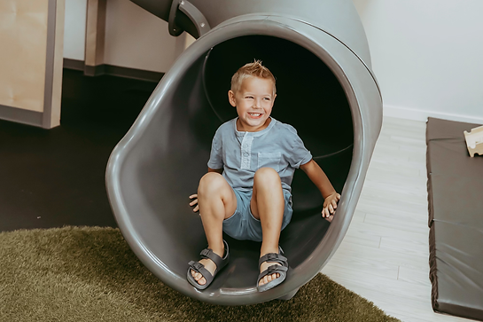Indoor fort-style play structure at Sunny Day Play Cafe