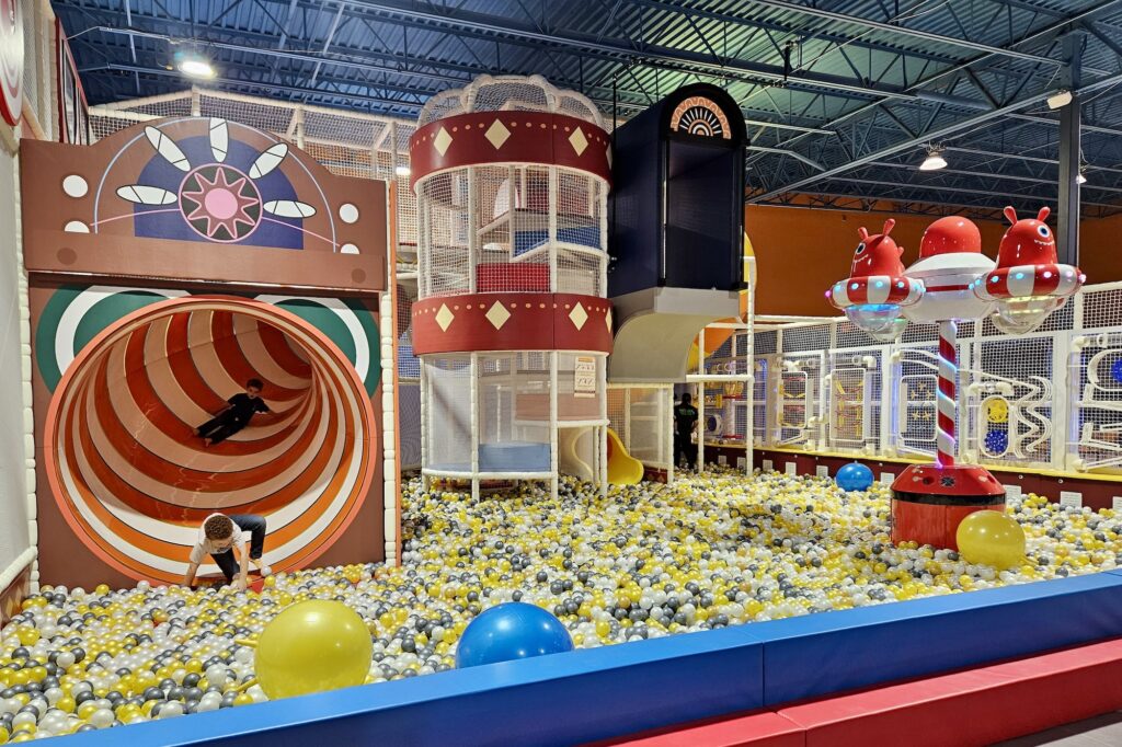 Indoor playground seating and play area at T&B Play in Canton.