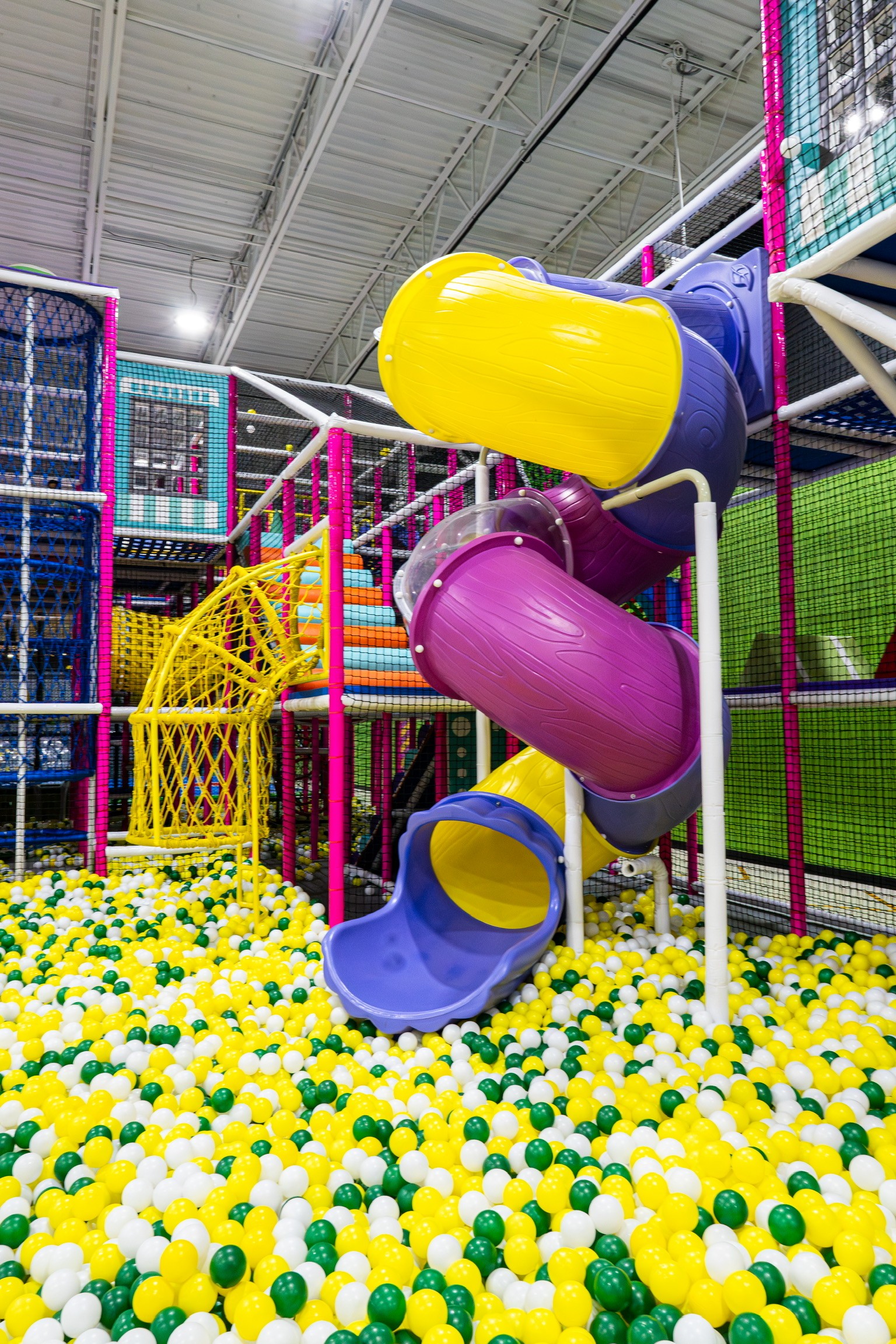 Tube slides and ball-pit style play structure at Takeoff Adventure Park.