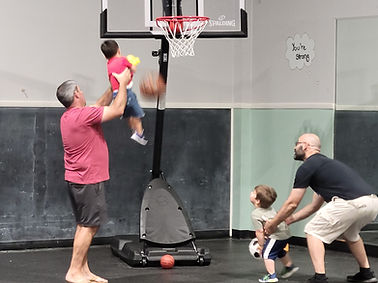 Family basketball play area at The Barnyard Indoor Playground.