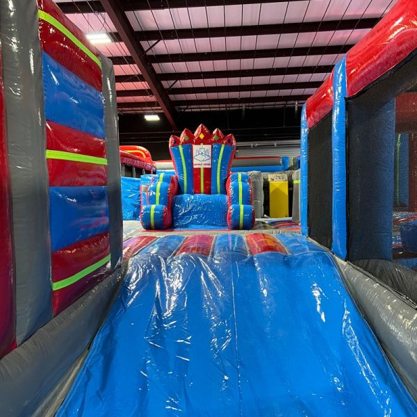 Inflatable play attractions inside The Bounce House Shreveport