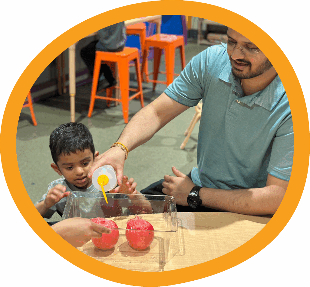 Adult and child exploring a guided activity at TCMU Greenville