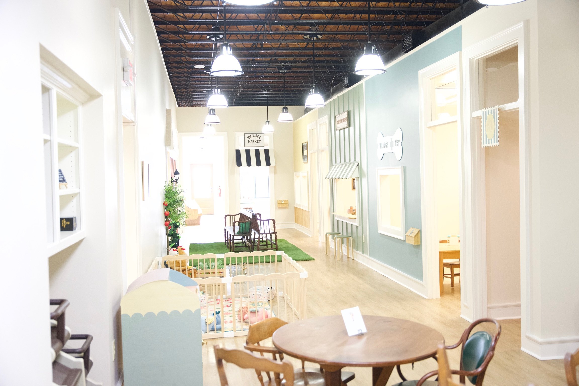 Play area and seating environment at The Little Village on 13th