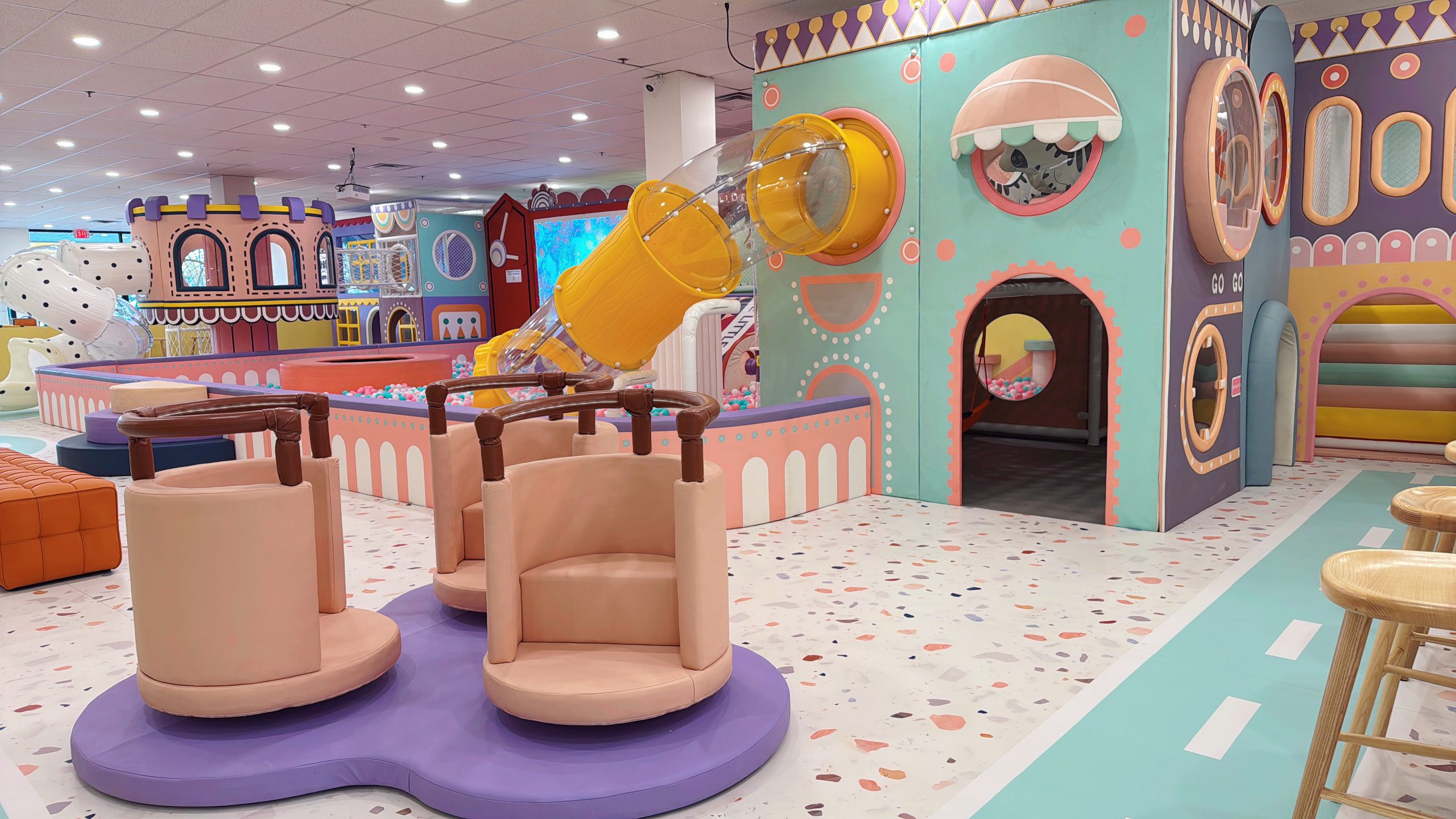 Slide and climbing area at The Littles Play Cafe