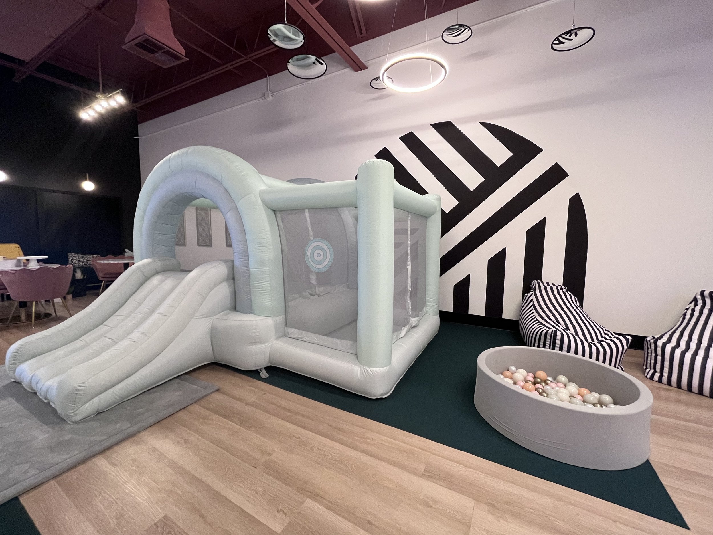 Play area and lounge seating at The Mom Lounge