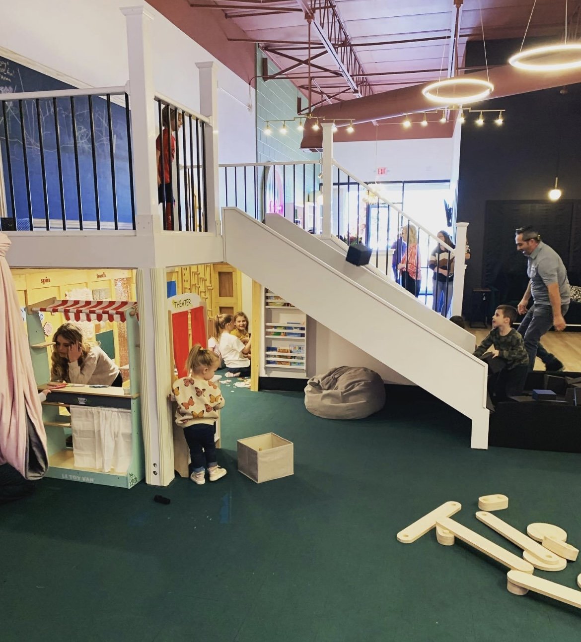 Indoor play setup with toys at The Mom Lounge