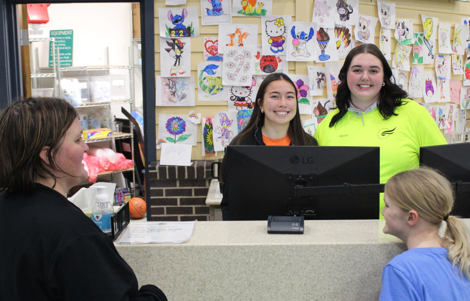 Child check-in area at The Neighborhood inside Rochester Athletic Club.