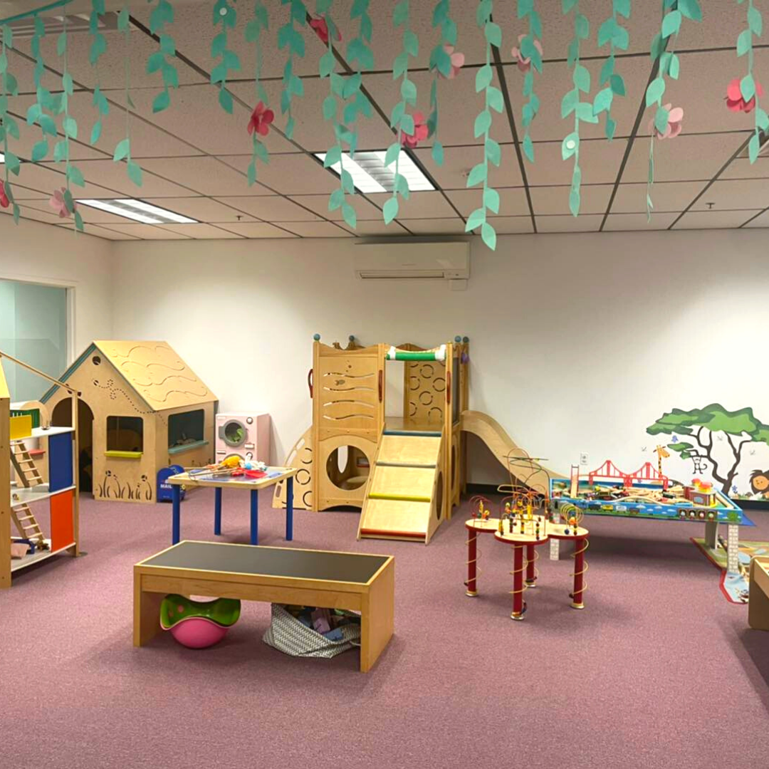 Open play area at The Rumpus Room with climbers, toys, and space for younger children.