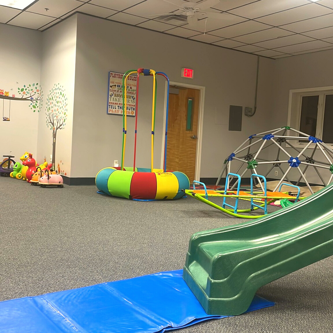 Indoor climber and slide area at The Rumpus Room.