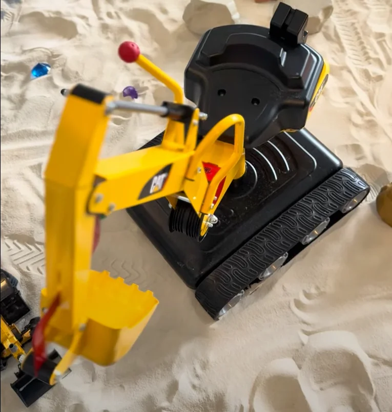 Close-up of indoor sand play materials at The Sandbox for Kids.