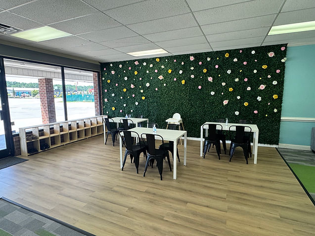 Seating and play area at The Tot Loft