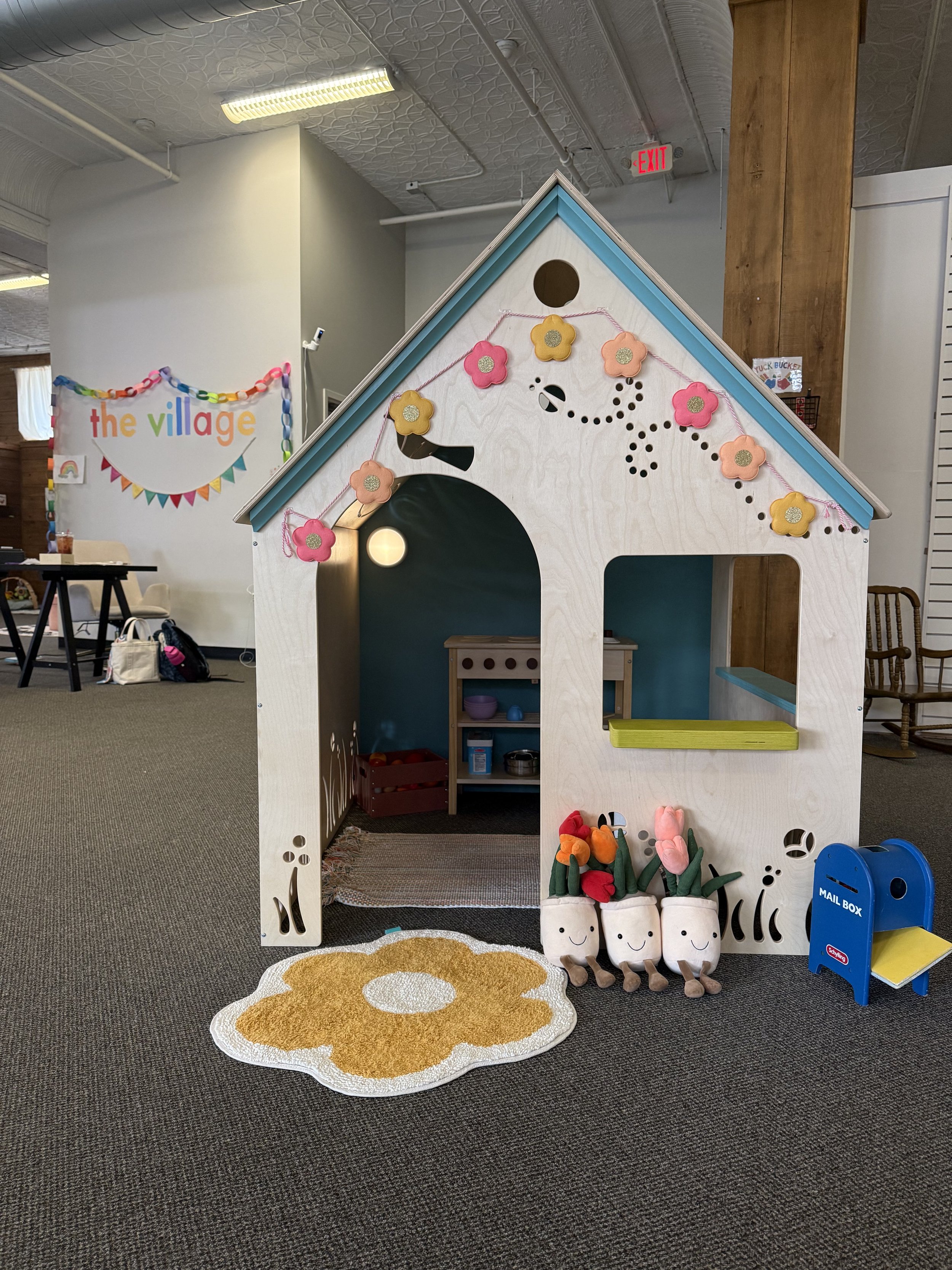 Pretend-play house and soft play area at The Village.