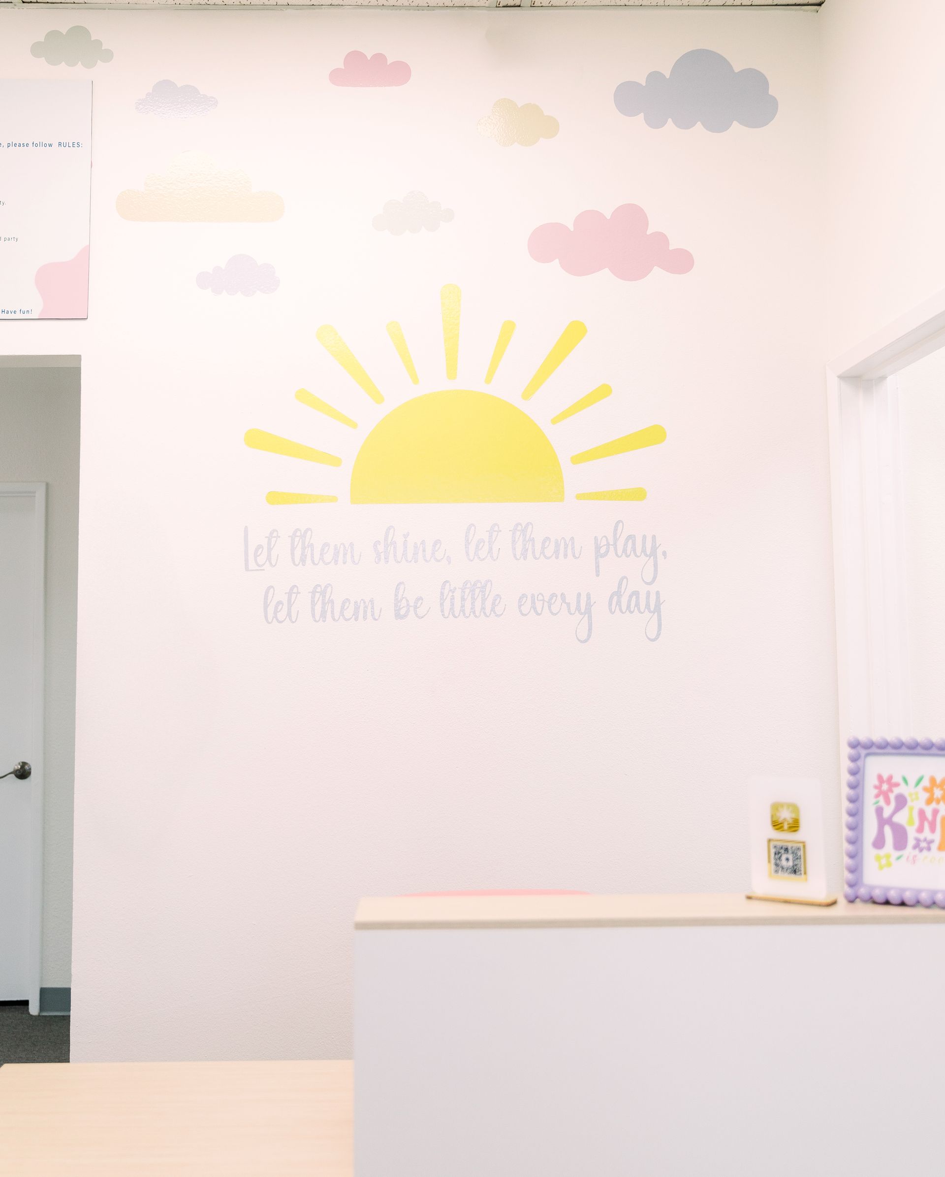 Bright front desk and welcome area inside Tiny Toddler Soft Play.