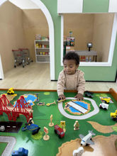 Child-sized pretend-play area at Tiny Town Playland