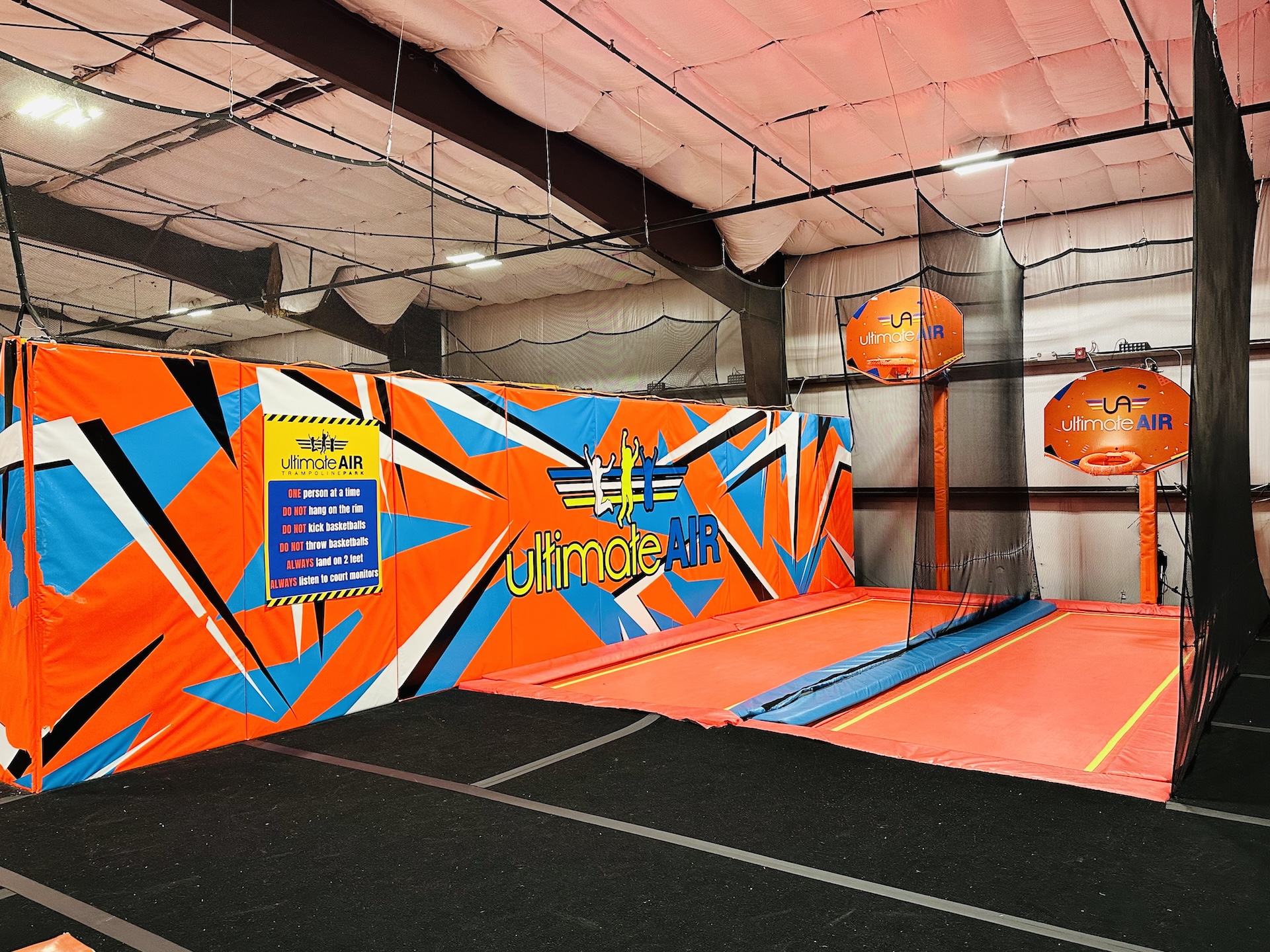 Visitors using trampoline attractions at Ultimate Air