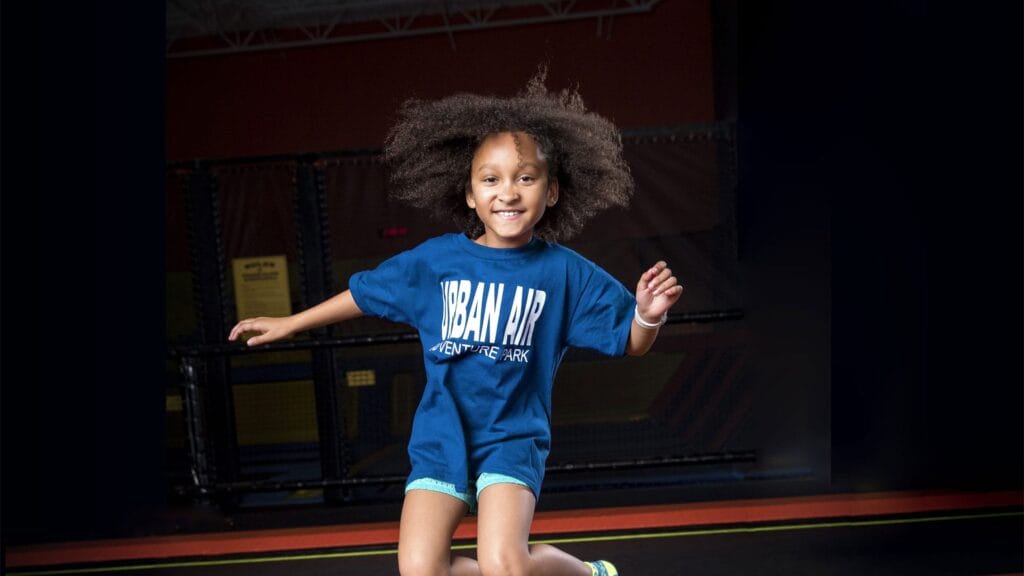 Child jumping at Urban Air Tulsa.