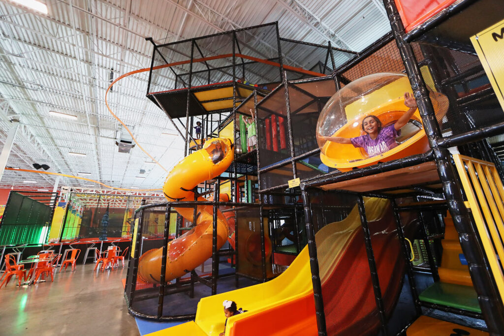 Kids riding mini go-karts at Urban Air White Marsh.