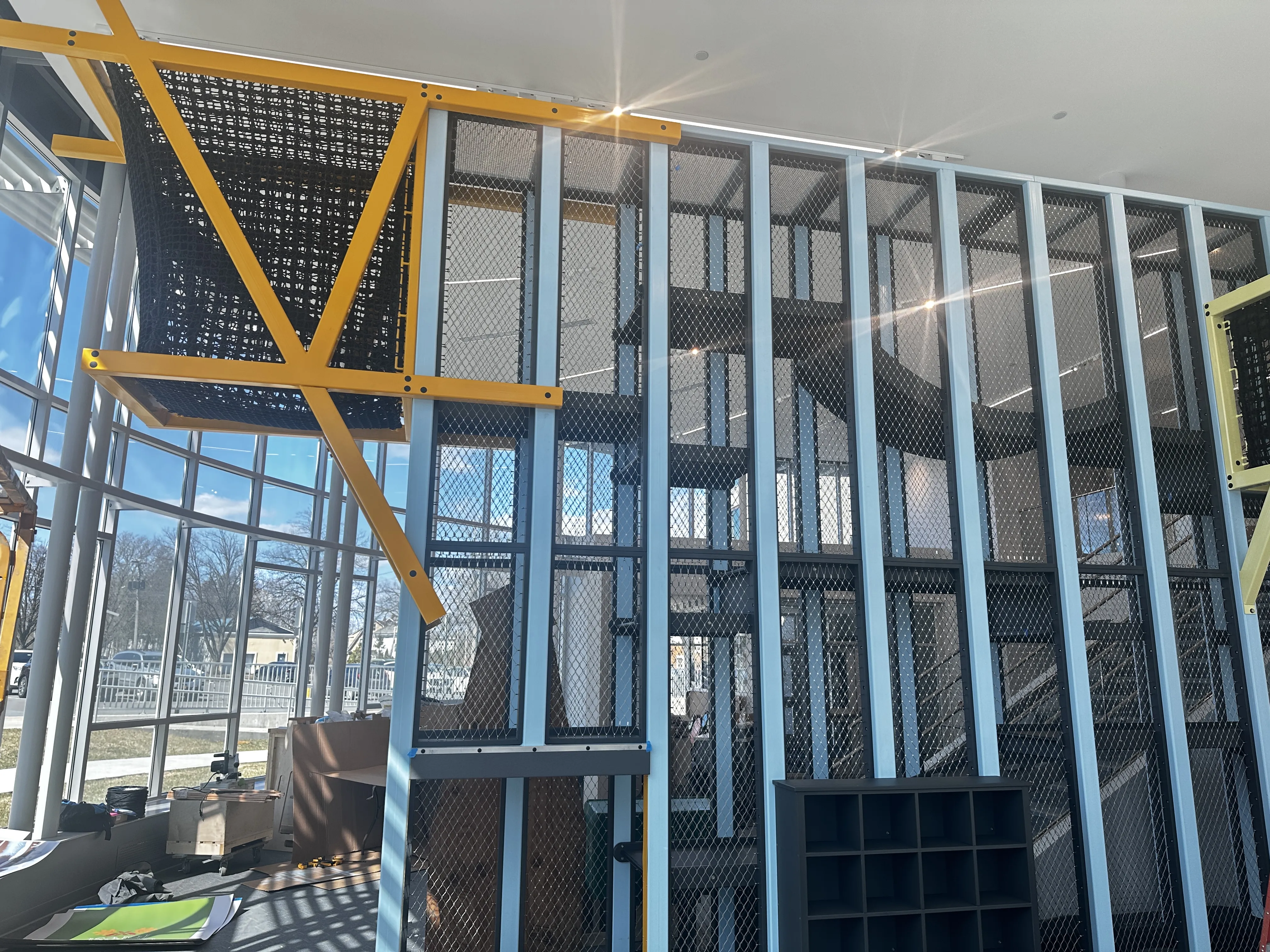 Two-story climber exhibit at Utica Children's Museum.