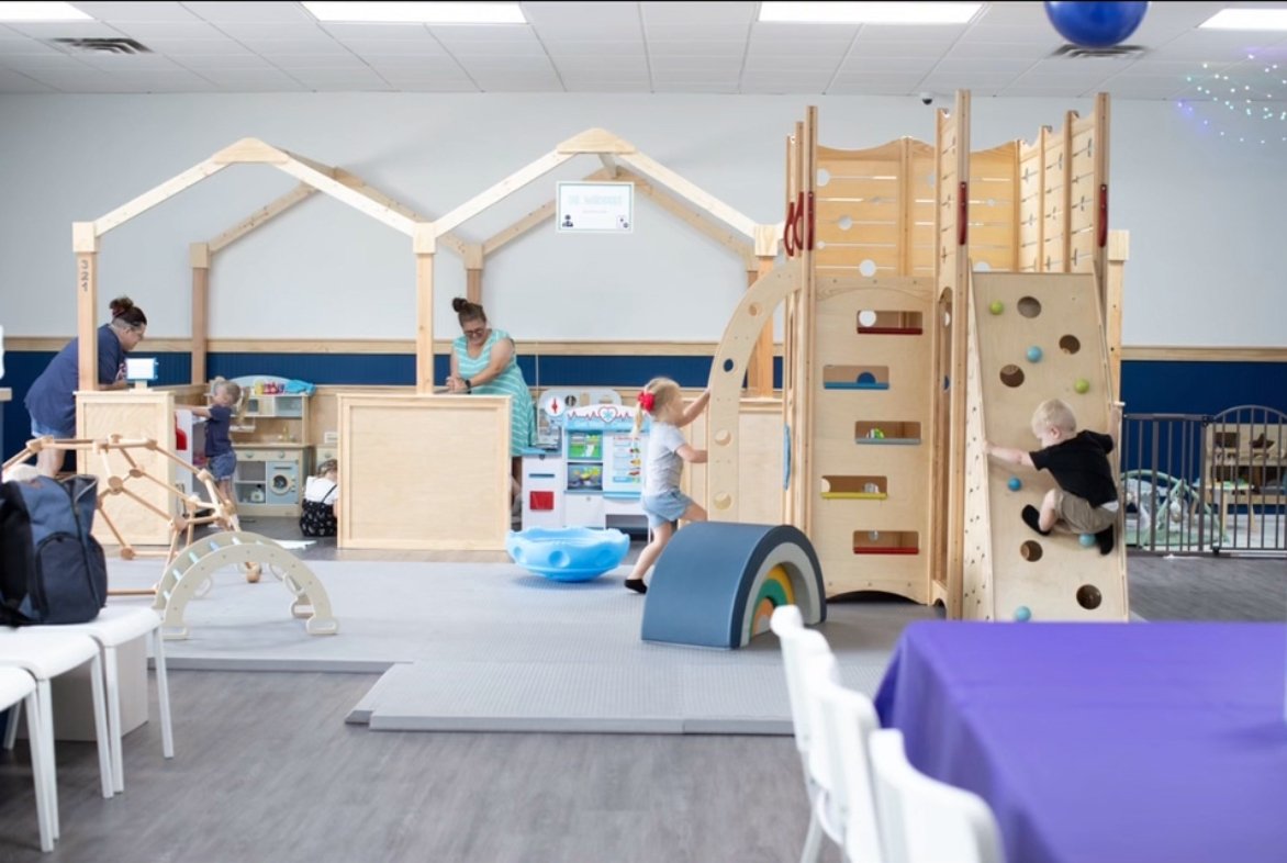 Wide view of the play floor at Waddles Indoor Playground