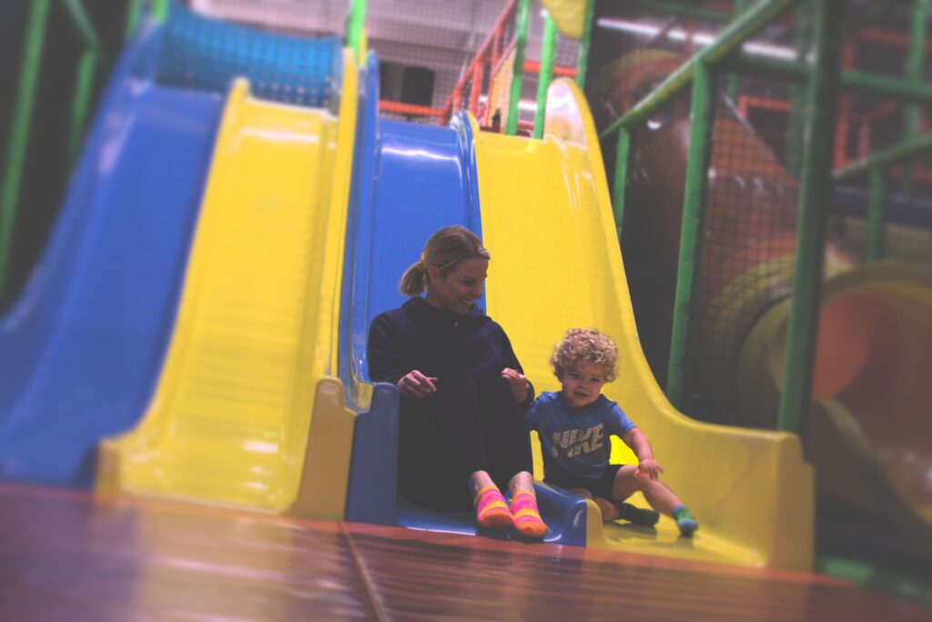 Slides and upper-level play area at We Play Spokane.
