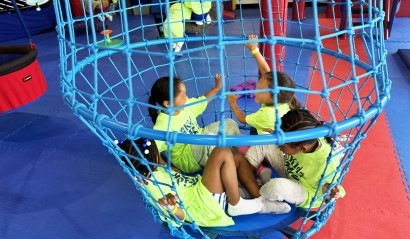 Children playing in the inclusive indoor gym at We Rock the Spectrum - Sugar Land.