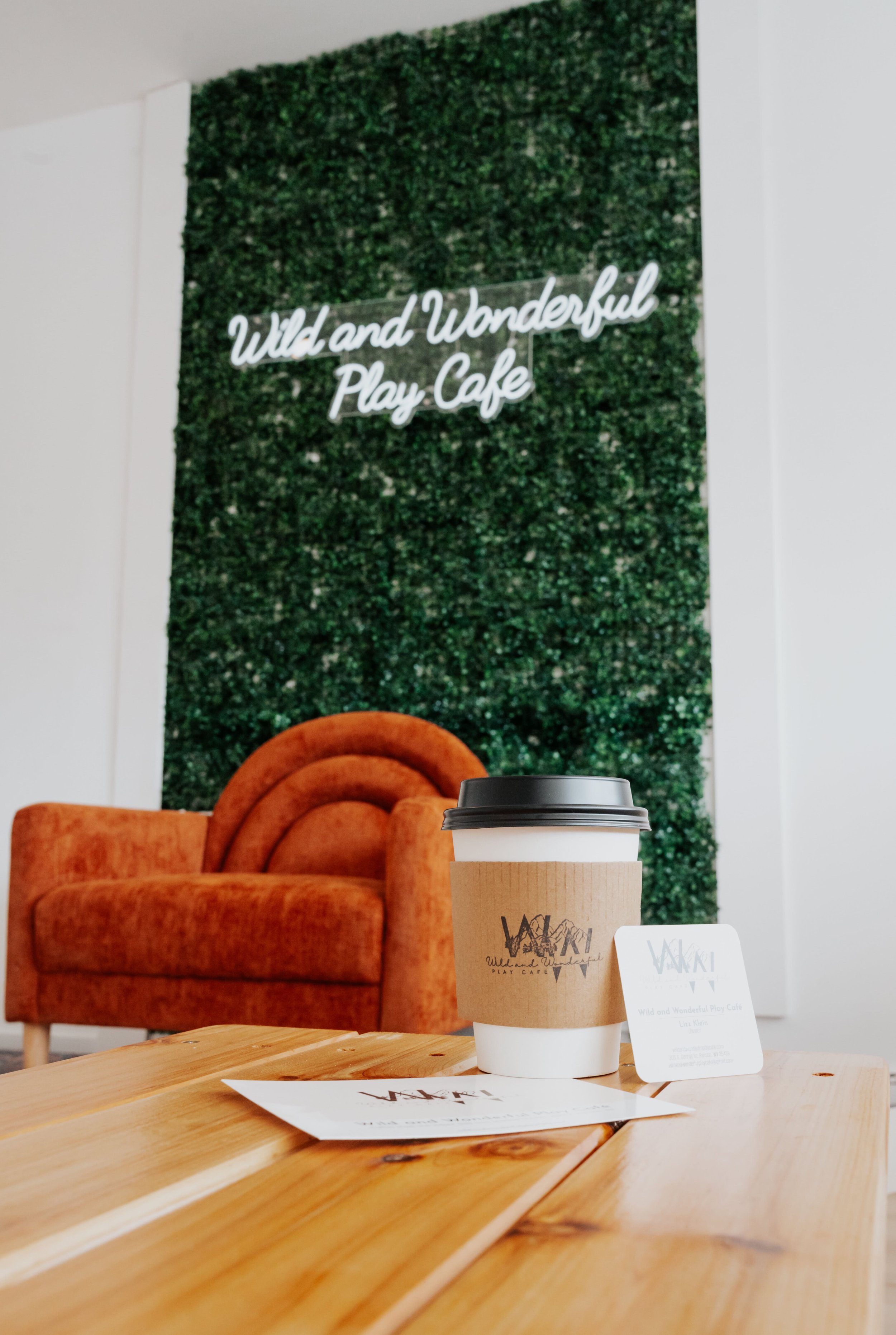 Caregiver seating and café area at Wild and Wonderful Play Café.