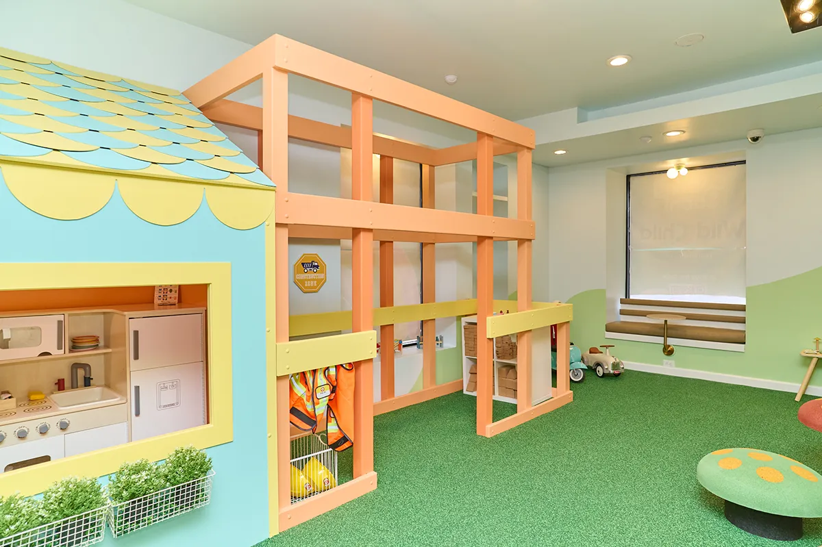Pretend-play house area at Wild Child Play Co.