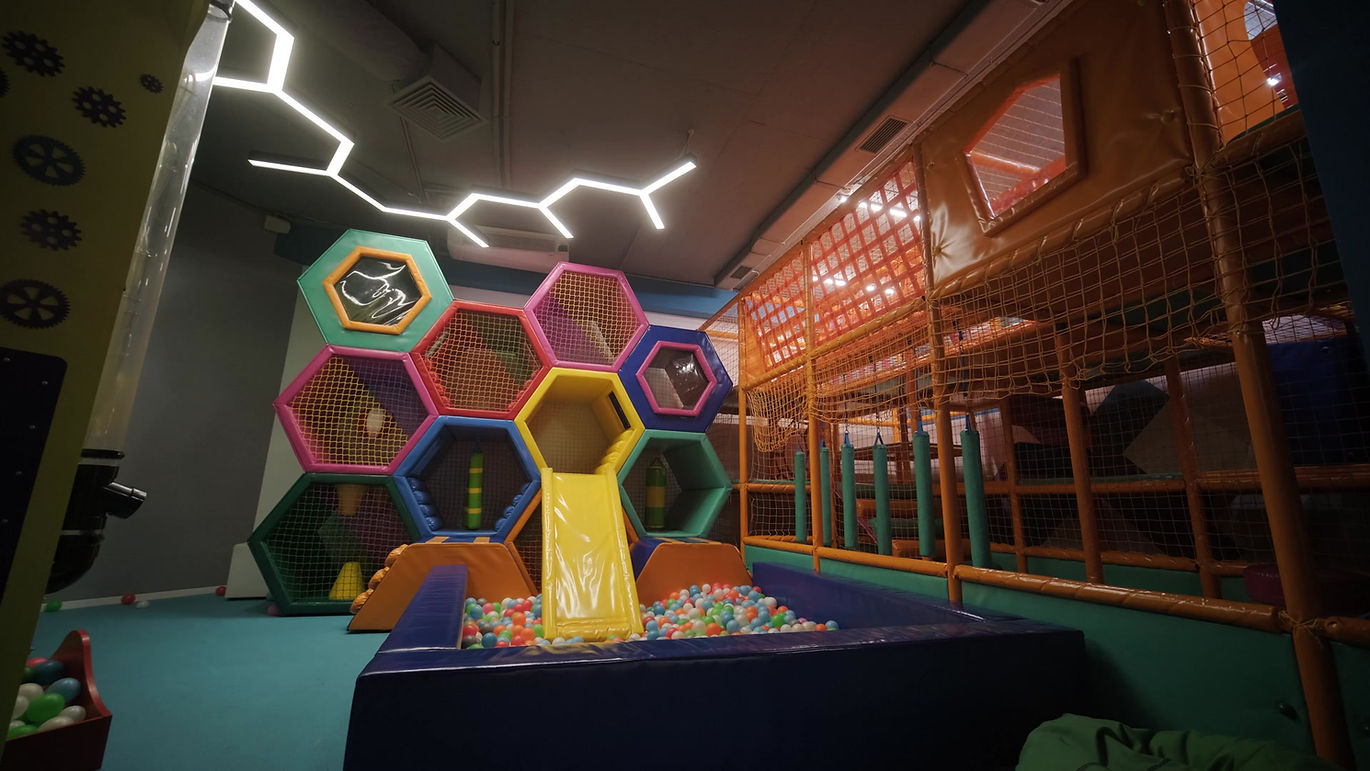 Indoor play area with a ball pit and climbing elements at Wonderworld Playzone in Somerset.